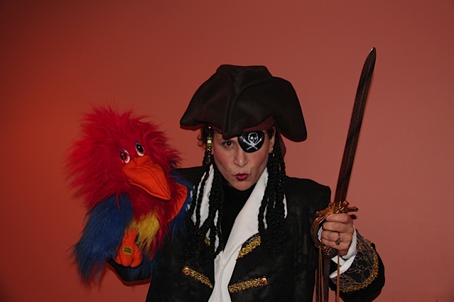 Halloween costumed character Pirate show- professional actress and children's pirate entertainer, Pirate show includes backgournd music, pirate and kid's Halloween sing-along songs, parot puppet, interactive musical games, treasure hunt with souvenirs, halloween or pirate animal balloons, color-in pirate treasure maps or Halloween pages for the kids