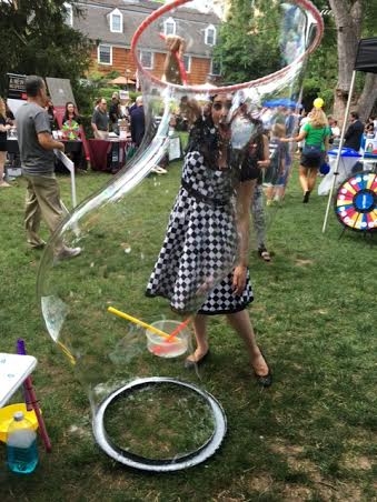 Soap bubbles maker, summer bubble parties for kids in New Jersey, giant bubble with child inside