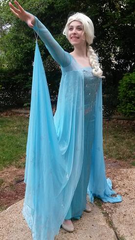 Princess Jennifer is professional stage actress and singer posing as Ice Queen Elsa for frozen theme birthday parties