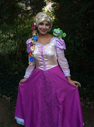 Princess Loren poses as Tower Princess Rapunzel for woodland themed birthday party show
