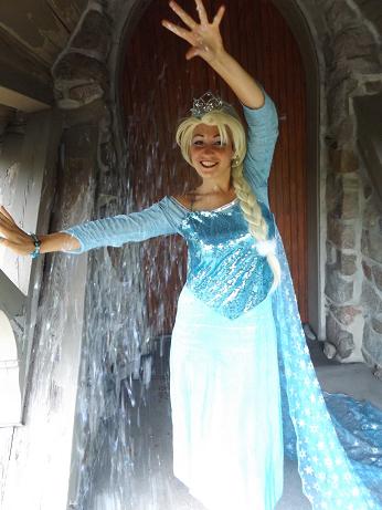 Princess Lucy- professional actress, singer, and dancer poses as frozen Ice Princess with make-a-wish snow dust and artic theme birthday party show, frozen Ice Queen Princess birthday party entertainer in New Jersey