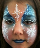 Professional fantasy Face Painters and make up artists apply non-toxic safe quality face paints with glitter highlights, full and half fantasy faces or simple hand or cheek art, frozen princess theme face painting, snowflake wintery holiday face painting for kid birthday and Xmas holiday parties