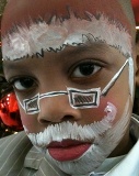 Professional holiday face paitning for kids parties, corporate events, and family holiday gatherings