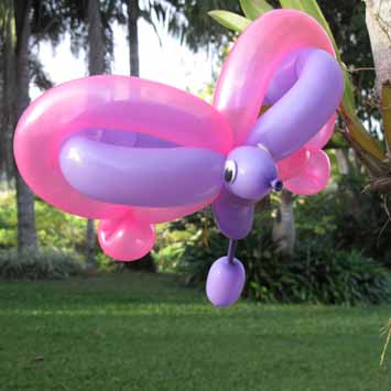 Butterfly theemed birthday party, hire professional Balloon Artist to create special butterfly balloon twist sculptures, Butterfly Fairy character performer entertains at butterfly theme parties
