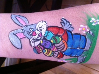Easter holiday themed face painting, professional holiday Face Painter in NJ, Easter designs and glitter tattoos