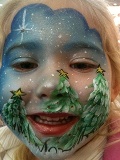 Christmas holiday themem face painting for children's birthday parties, holiday events, and frozen princess theme parties